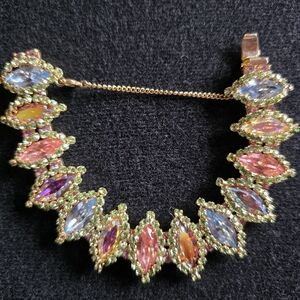 Vintage Multi -Color Juliana Rhinestone Bracelet With Safety Chain. (Gold Tone)
